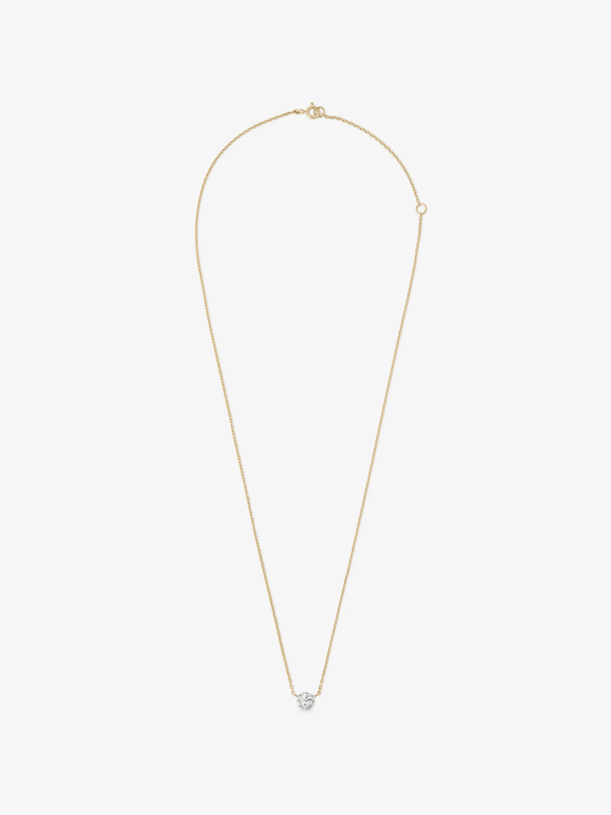 Jessica McCormack white gold pendant necklace with a delicate chain and 0.25ct cut down diamond pendant on a plain background View 1