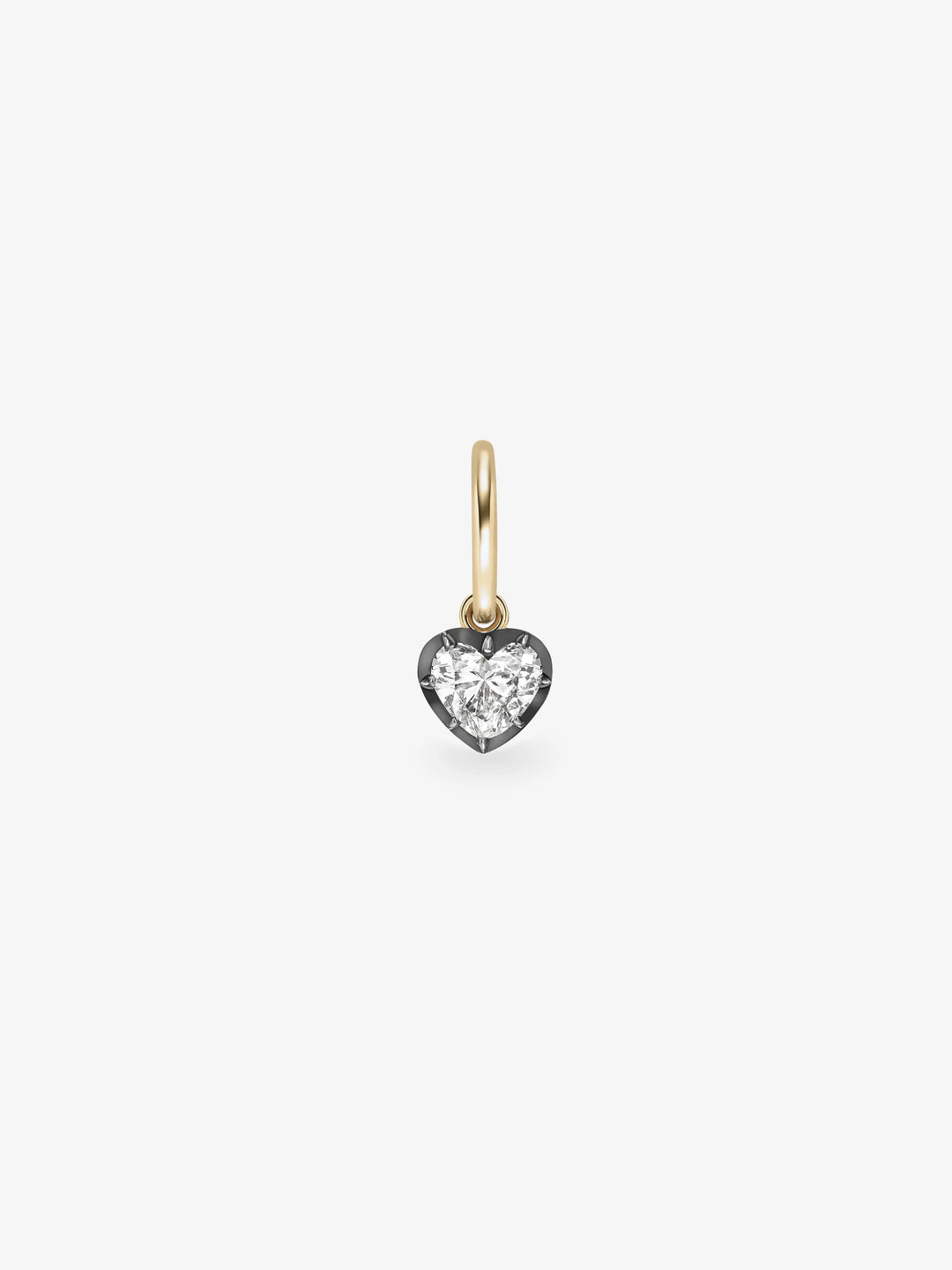 Single hoop earring featuring a 0.70ct heart-shaped diamond set in blackened gold, combining antique-inspired craftsmanship with contemporary design.  View 1