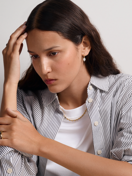 0.70ct Pear-Shaped Diamond & White Gold Gypset Point Down Hoop Earrings