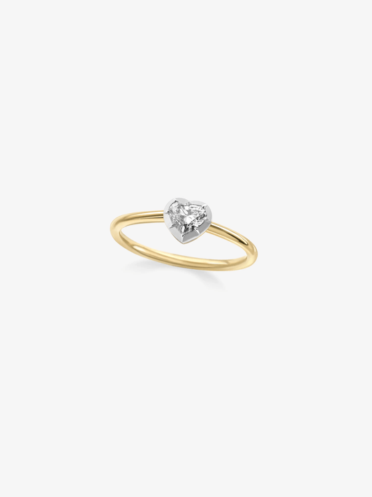 Jessica McCormack ring featuring a heart shaped diamond in a white gold setting on a slender yellow gold band, showcasing contemporary diamond jewellery craftsmanship View 2