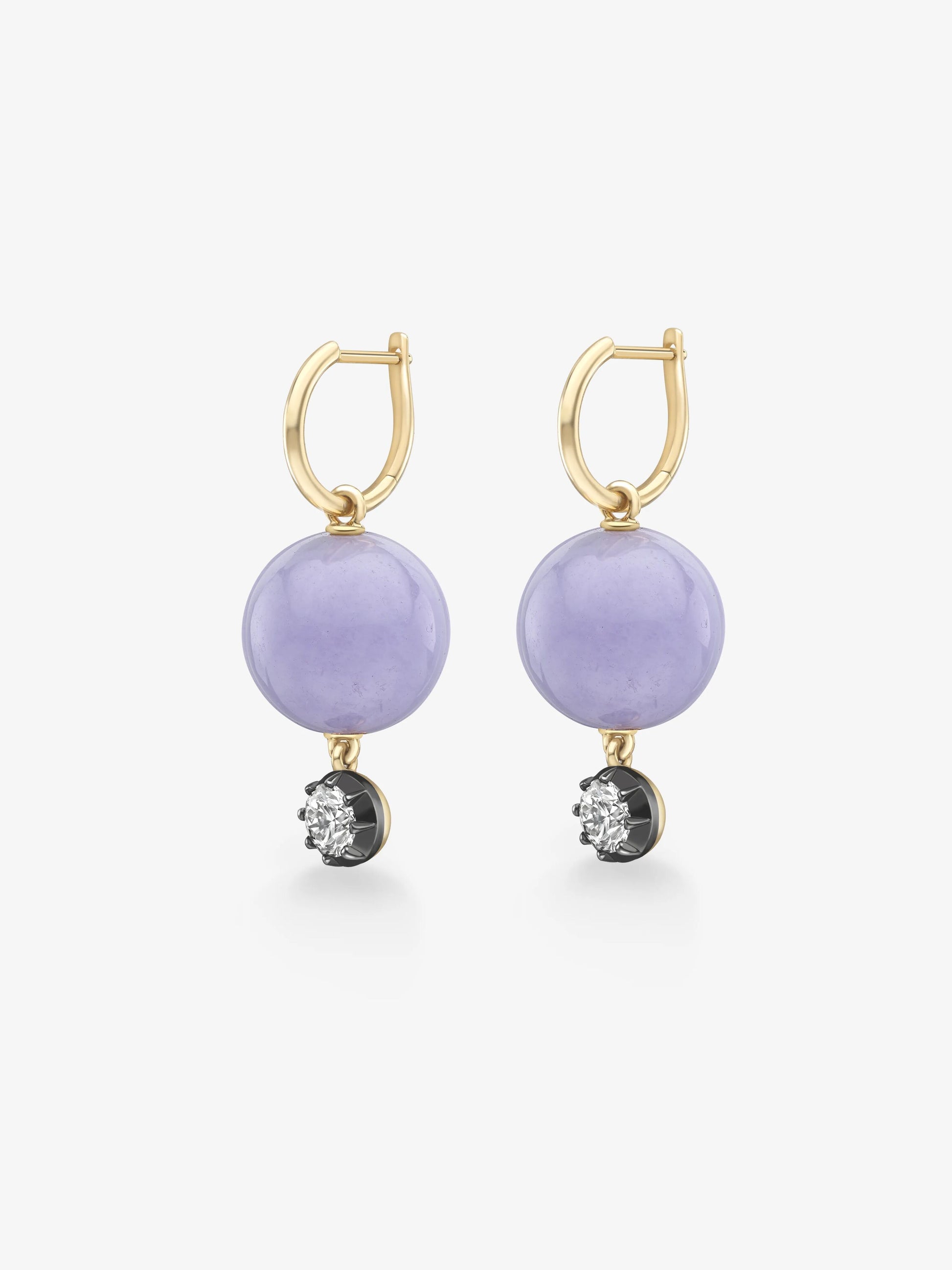 Pair of hoop earrings featuring lilac jade spheres and 0.40ct diamonds set in 18K yellow gold with blackened detailing, blending antique inspiration with contemporary style. View 2