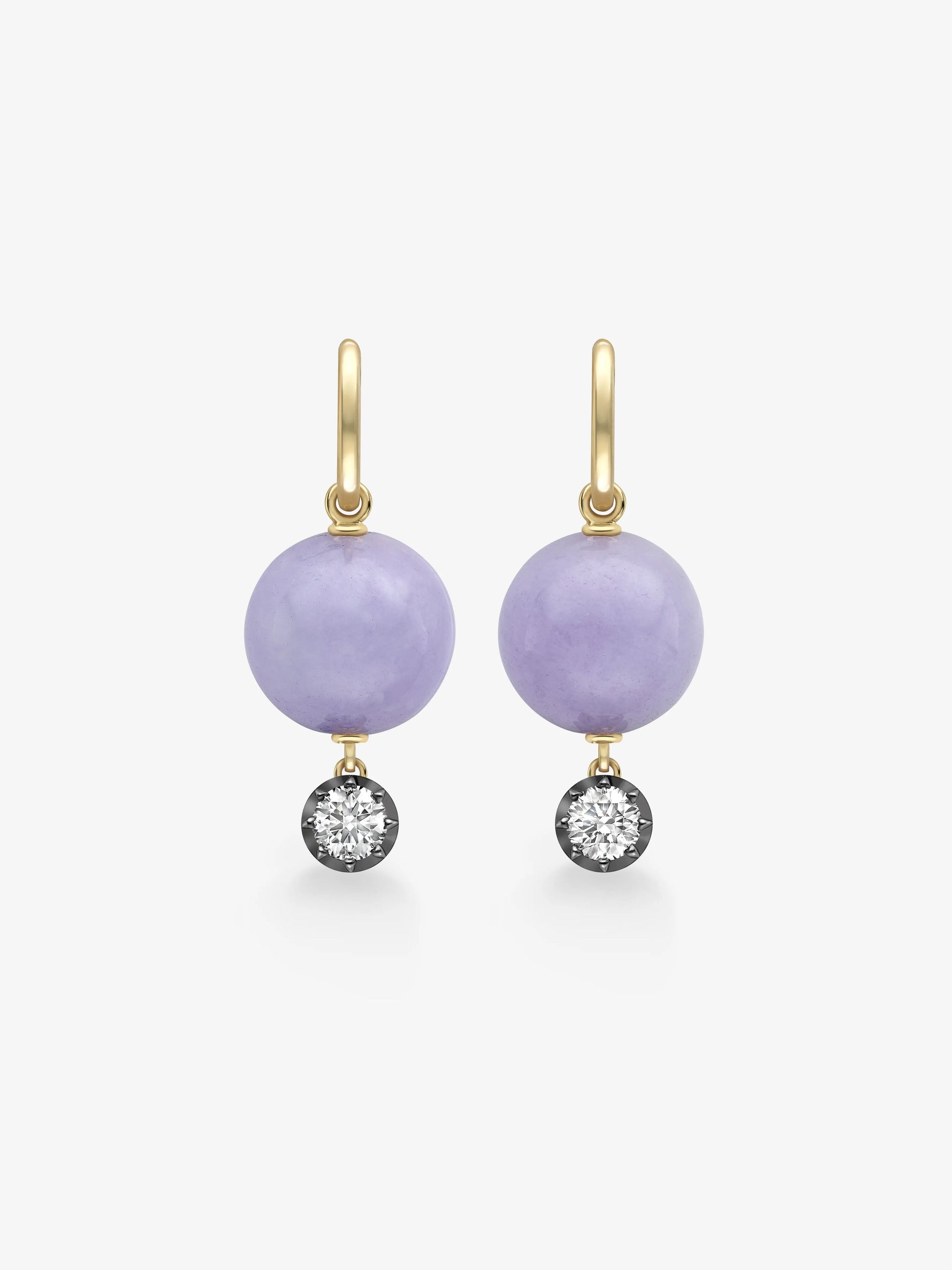Pair of hoop earrings featuring lilac jade spheres with 0.40ct diamonds set in blackened gold, combining antique-inspired craftsmanship with contemporary elegance. View 1