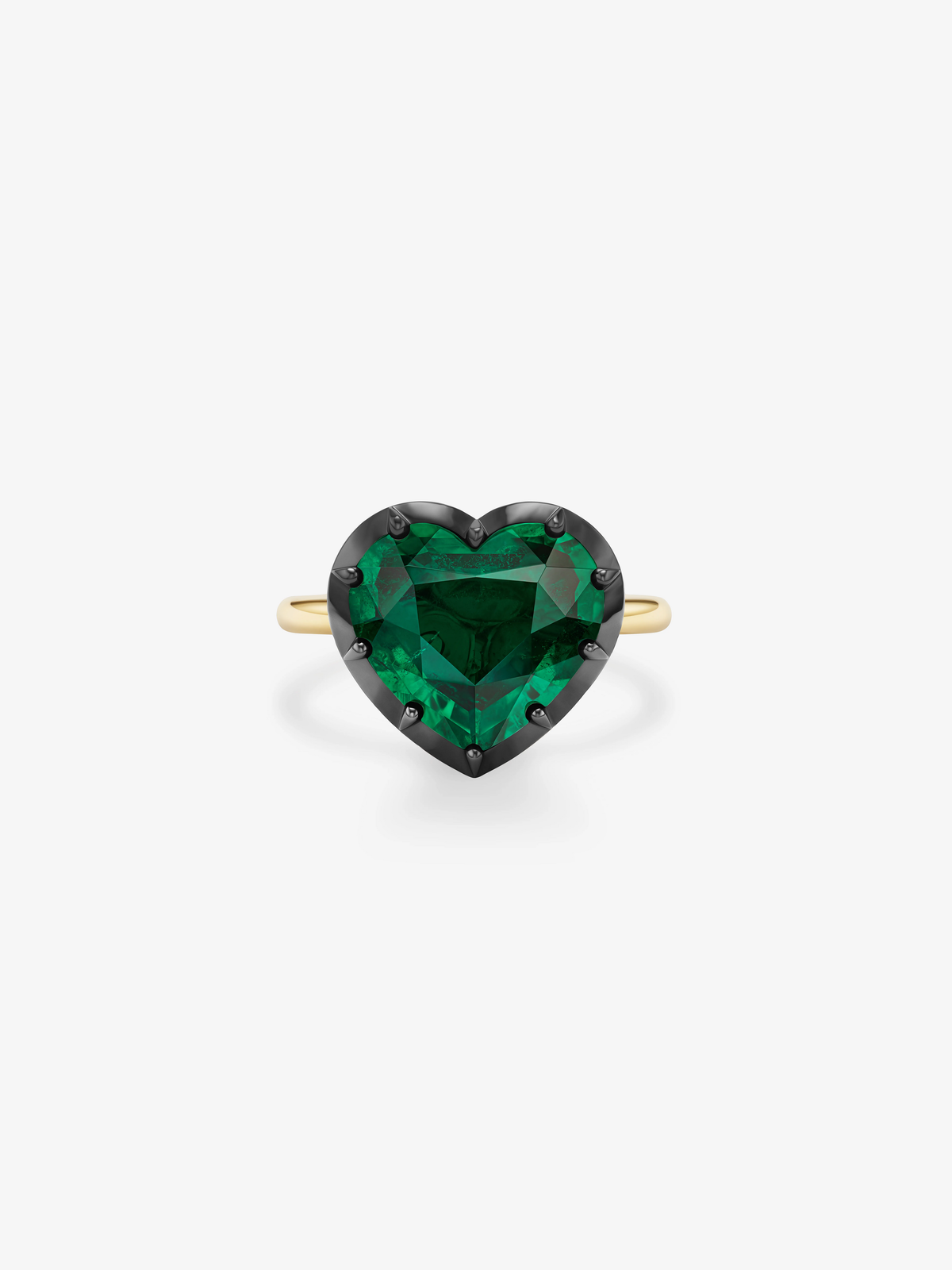 Heart shaped emerald ring in a blackened gold setting with a yellow gold band showcasing bold contemporary craftsmanship View 1