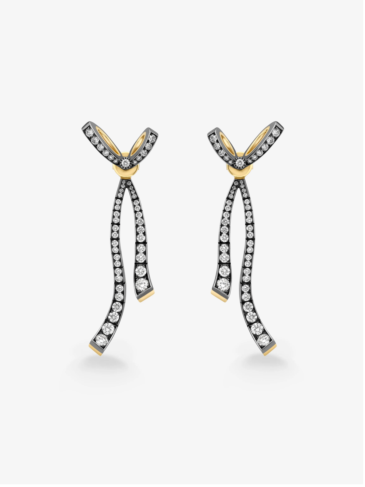 Jessica McCormack diamond ribbon drop earrings in blackened gold with curved bow details, diamond set loops and polished yellow gold accents View 1
