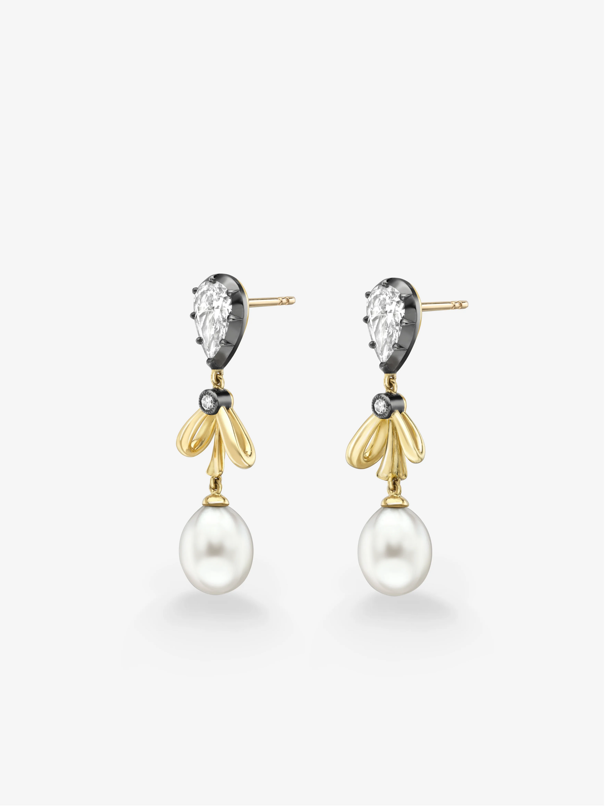 Diamond and gold bow earrings with sculptural loops, oval diamonds and large white pearl drops on a white background View 2