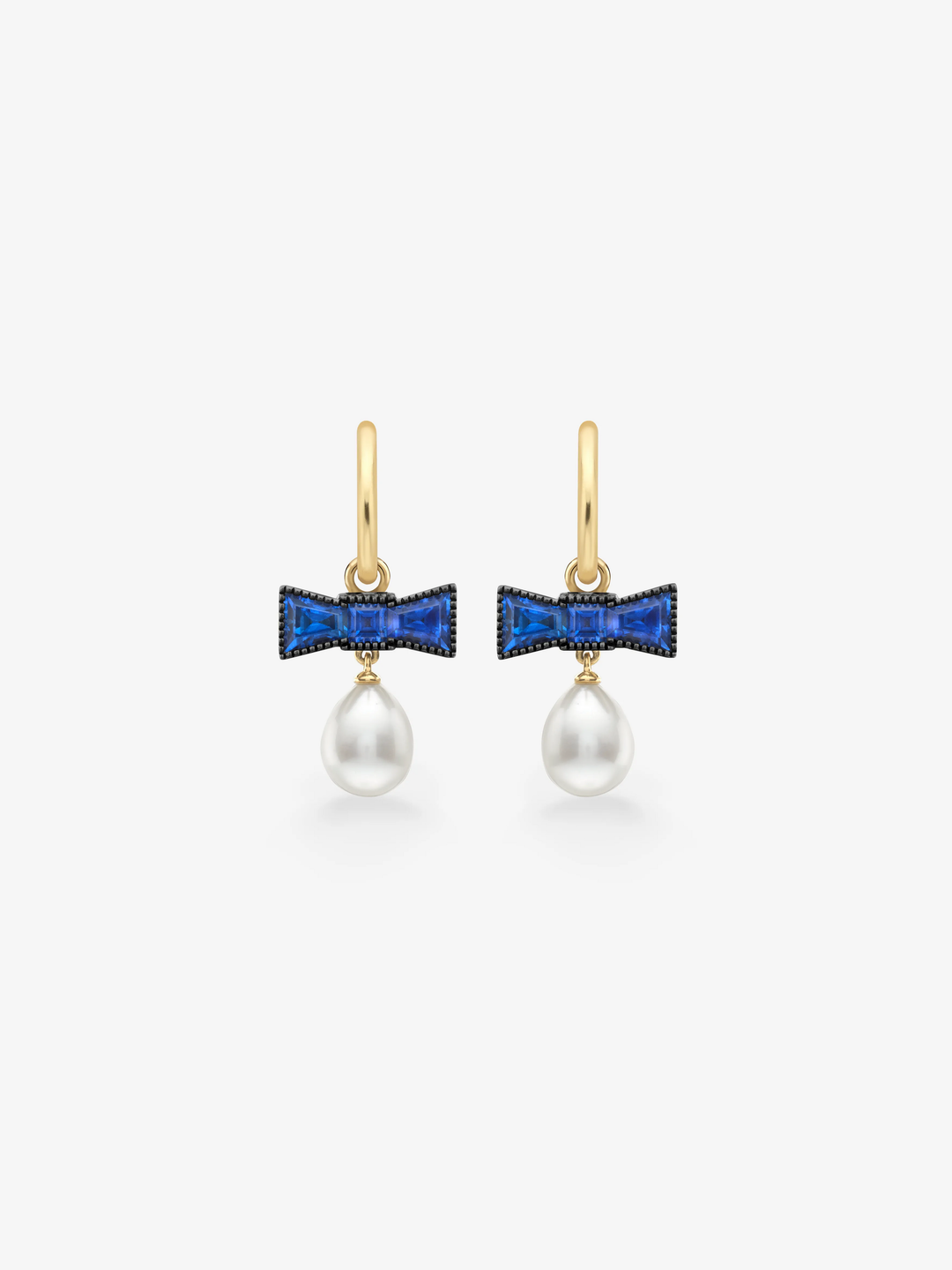 Jessica McCormack sapphire and pearl hoop earrings with blue bow shaped settings and lustrous white pearl drops in gold  View 1