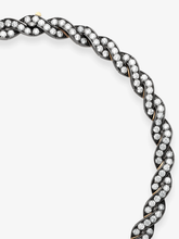 Jessica McCormack diamond and blackened gold ribbon necklace with intertwined strands and pavé set diamonds, showcasing bold contemporary craftsmanship