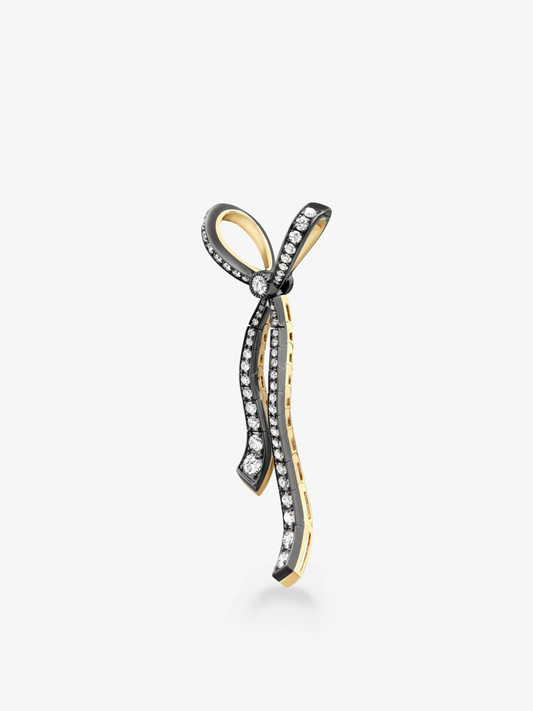 Pave-set diamond bow pendant with a long curved ribbon drop in blackened and yellow gold View 4