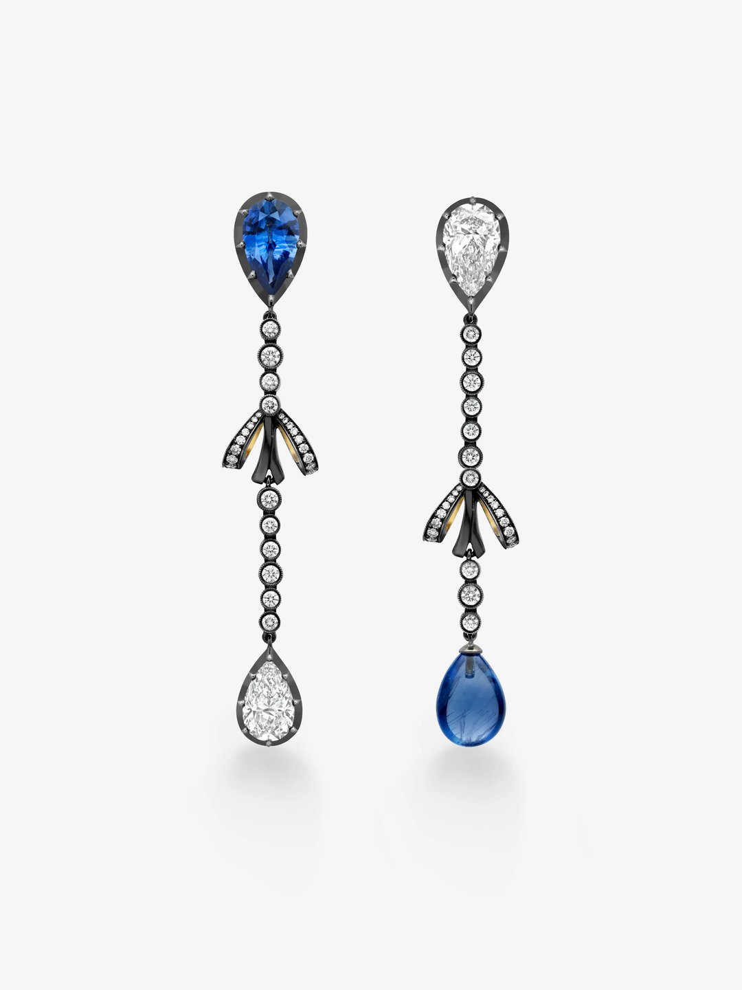 Jessica McCormack asymmetric diamond and sapphire drop earrings with bow details and alternating blue sapphire and diamond pear shaped drops  View 1