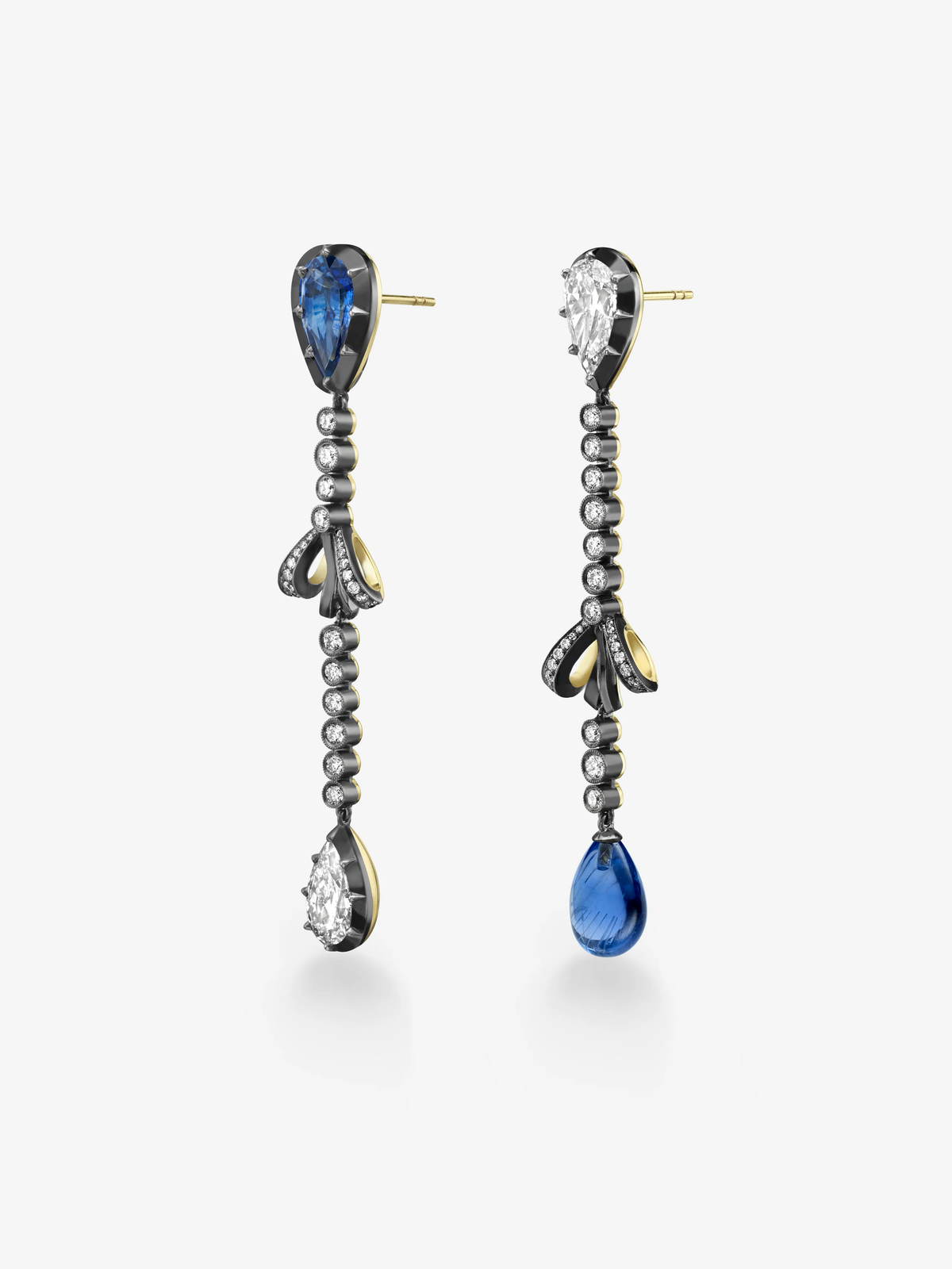 Asymmetric diamond and sapphire drop earrings with beaded chains, bow motifs, and contrasting blue sapphire and diamond drops View 2