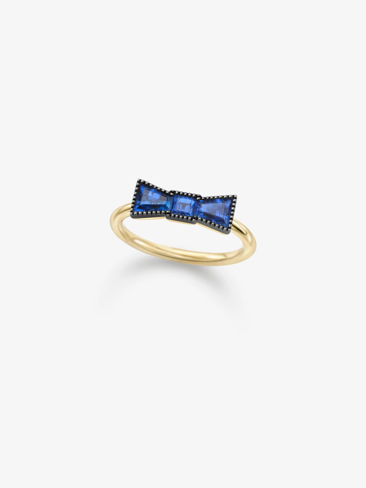 Gold bow sapphire ring featuring vivid blue sapphires and a polished rounded band, blending antique-inspired artistry with contemporary style View 2
