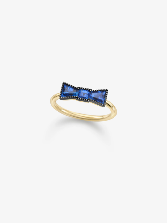 Gold bow sapphire ring featuring vivid blue sapphires and a polished rounded band, blending antique-inspired artistry with contemporary style View 2