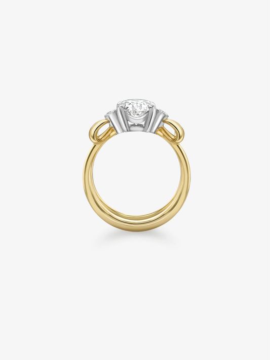 Jessica McCormack 1.99ct oval diamond ring with a yellow gold band, white gold setting and sculptural bow details View 4