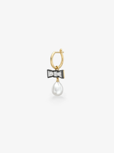 Single gold hoop earring with a diamond bow detail and a lustrous pearl drop, combining antique-inspired artistry with contemporary style