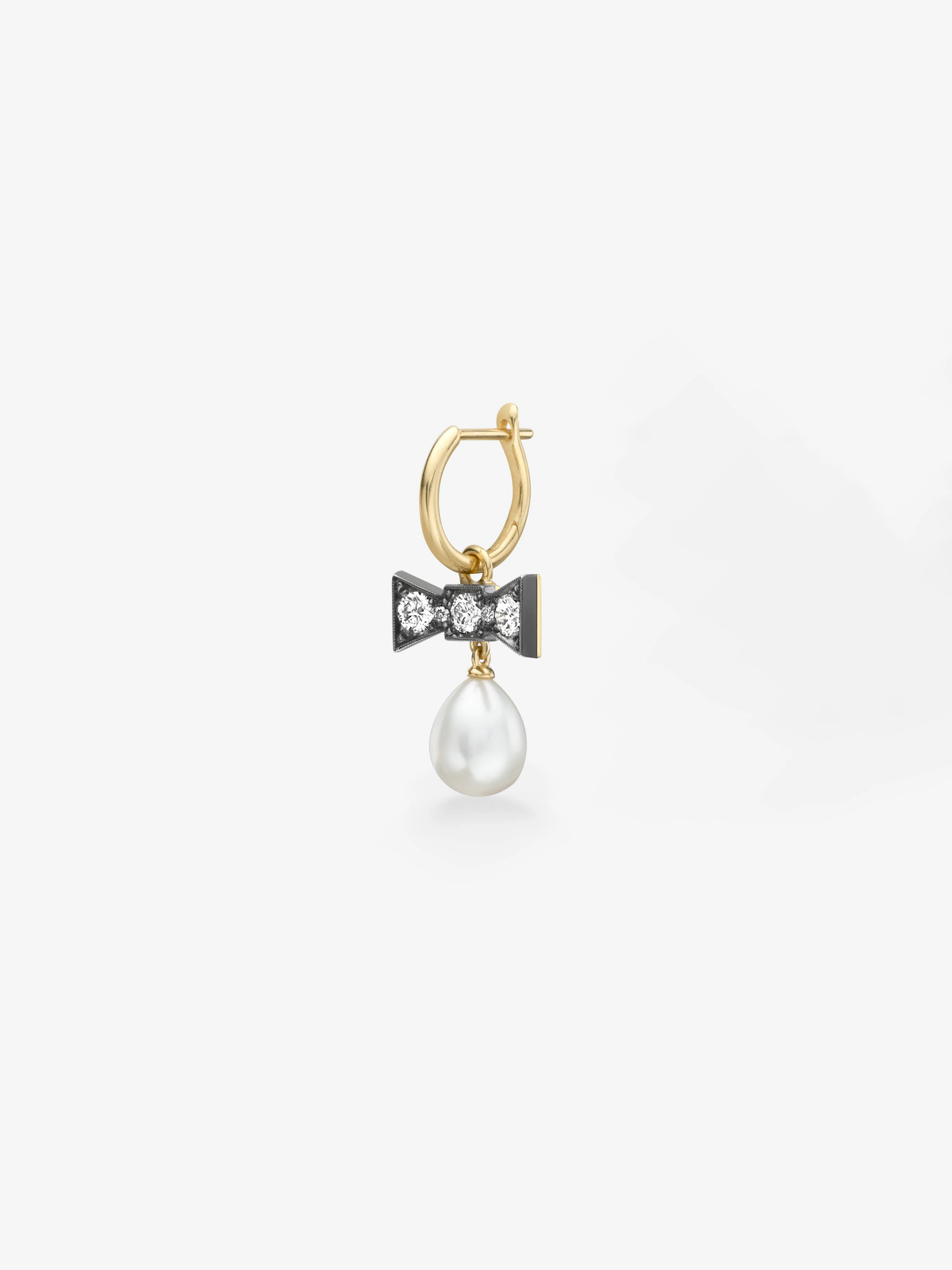 Jessica McCormack single gypset hoop earring in yellow gold with a diamond bow and lustrous pearl drop, blending antique inspired artistry with contemporary style View 2