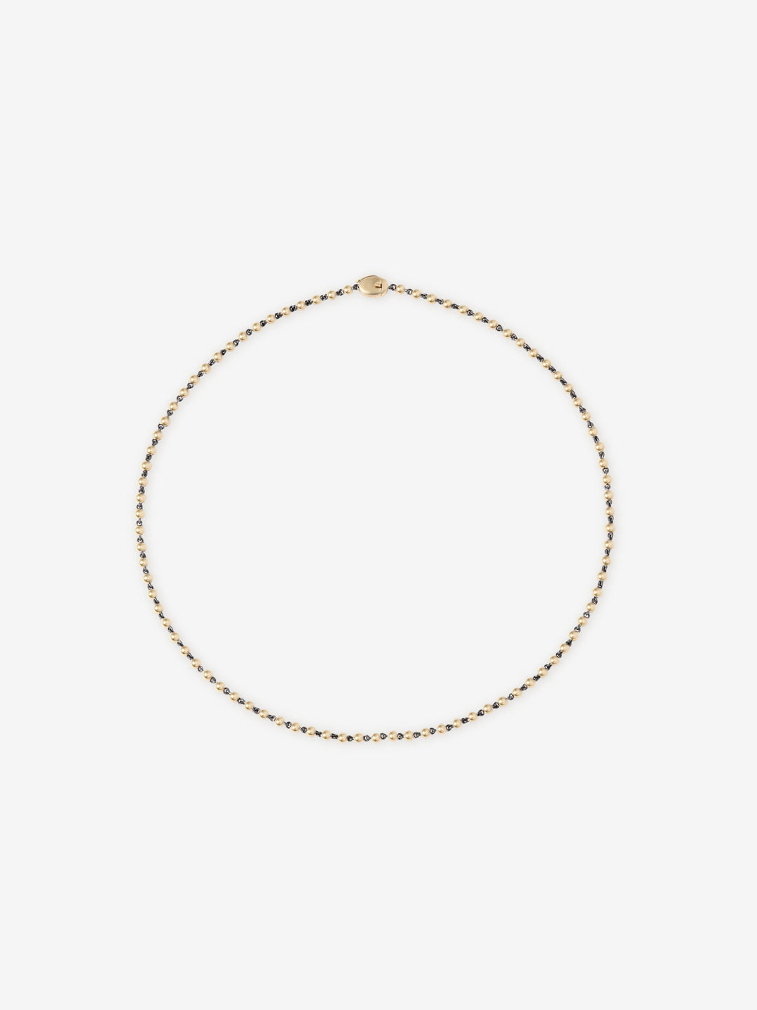 Delicate yellow gold micro ball and chain necklace with a smooth clasp, showcasing fine craftsmanship and a minimalistic, contemporary design.  View 1