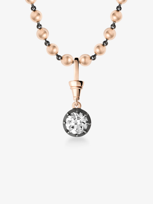 Rose gold ball chain necklace featuring a round brilliant diamond pendant set in blackened white gold, showcasing handcrafted antique-inspired design and traditional techniques. View 2