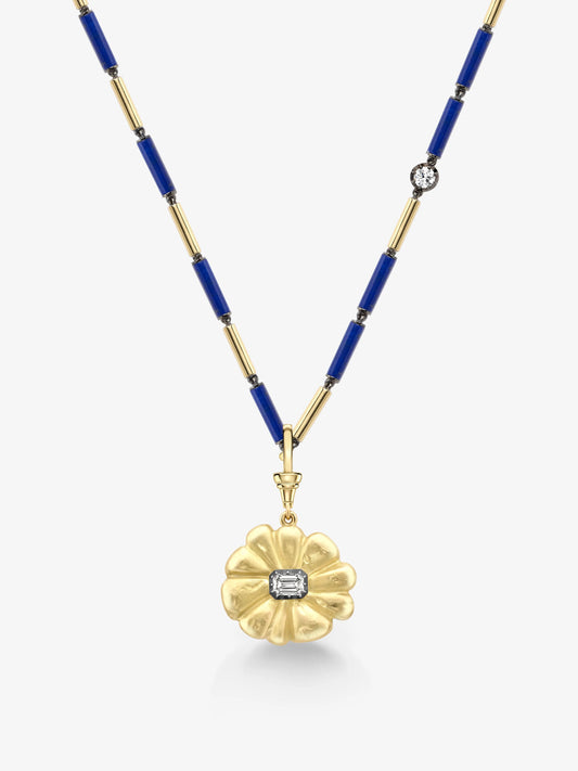 Contemporary necklace featuring a gold flower medallion pendant with an emerald-cut diamond center, suspended on a blue and gold beaded chain. View 2