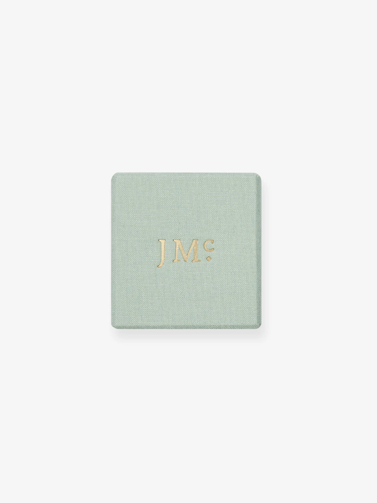 Pale green Jessica McCormack jewellery box with gold JM initials on the lid View 4