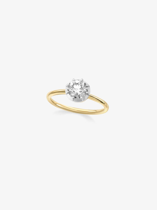 Delicate 0.90ct diamond set in a handcrafted white gold button back setting with a slender yellow gold band, blending antique-inspired and contemporary design. View 2
